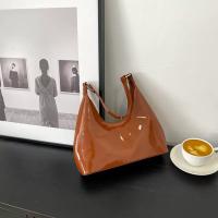 woman's glossy bag