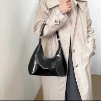 woman's glossy bag